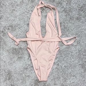 Blush colored one piece swimsuit